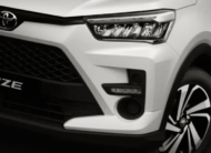 Toyota Raize white compact SUV front side view