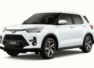 Toyota Raize white compact SUV front side view