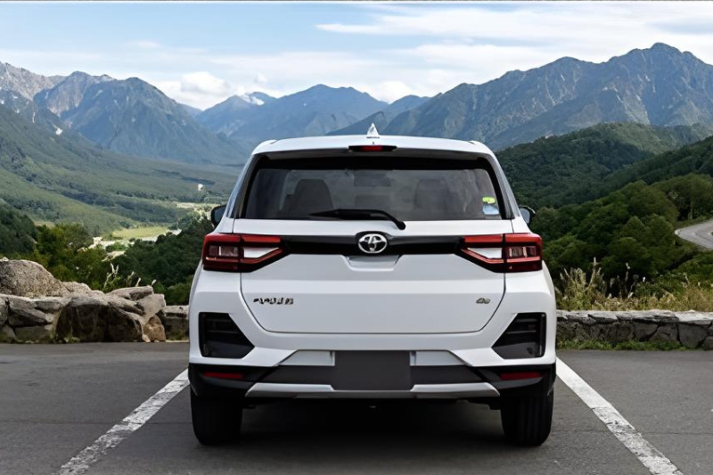 White Toyota Raize 2022 compact SUV parked on mountain road