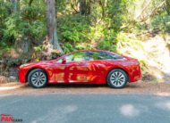 2021 Toyota Mirai hydrogen fuel cell sedan in red color