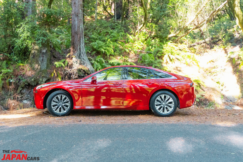 2021 Toyota Mirai hydrogen fuel cell sedan in red color