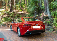 2021 Toyota Mirai hydrogen fuel cell sedan in red color