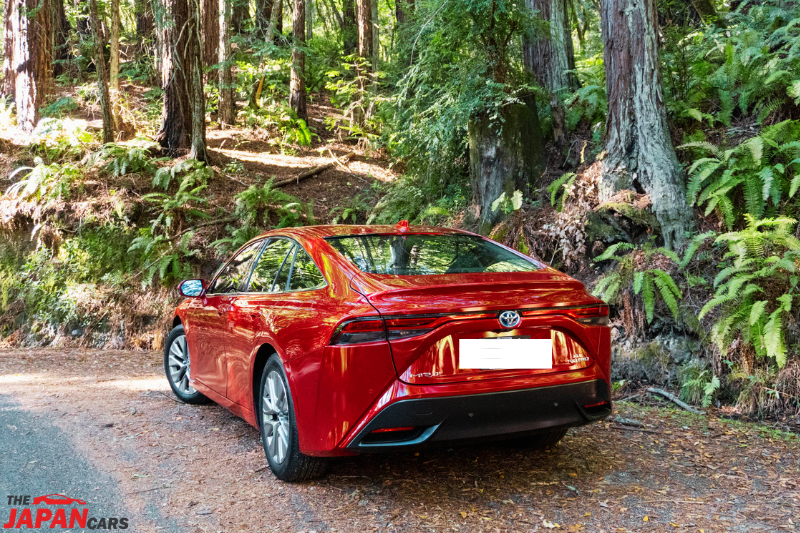 2021 Toyota Mirai hydrogen fuel cell sedan in red color