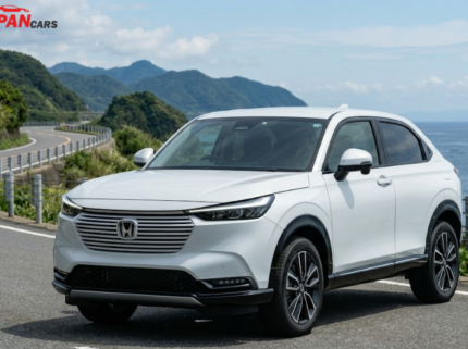 2023 Honda Vezel hybrid SUV in white on scenic road