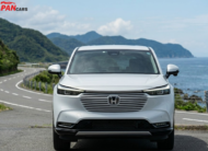 2023 Honda Vezel hybrid SUV in white on scenic road