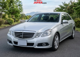 Mercedes-Benz E300 2012 silver luxury sedan with 3.0L engine parked on road