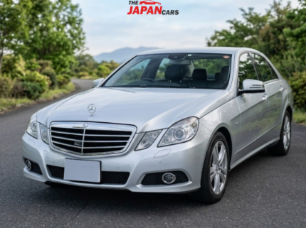 Mercedes-Benz E300 2012 silver luxury sedan with 3.0L engine parked on road