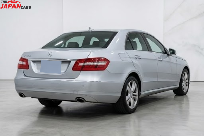 Mercedes-Benz E300 2012 silver luxury sedan with 3.0L engine parked on road