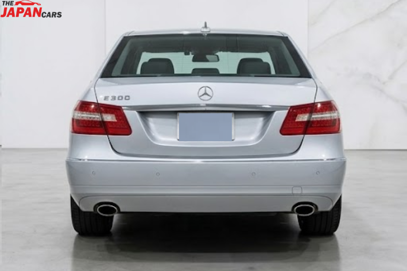 Mercedes-Benz E300 2012 silver luxury sedan with 3.0L engine parked on road