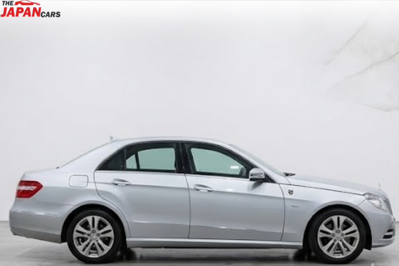 Mercedes-Benz E300 2012 silver luxury sedan with 3.0L engine parked on road