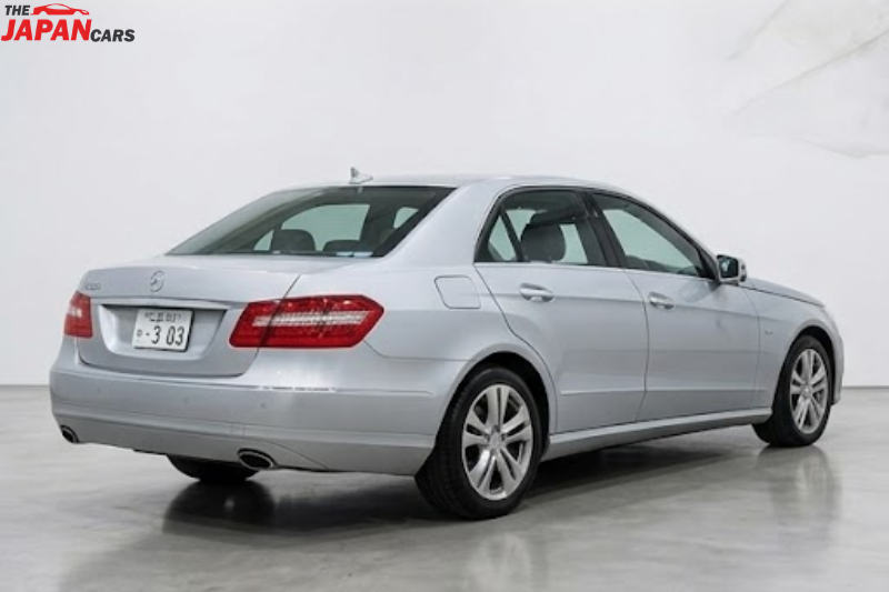 Mercedes-Benz E300 2012 silver luxury sedan with 3.0L engine parked on road