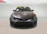 2021 Toyota Camry sedan in metallic brown front side view