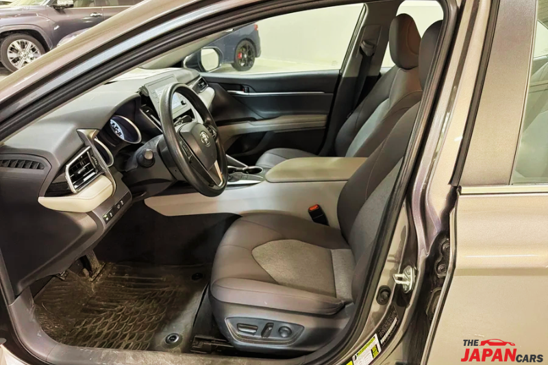 2021 Toyota Camry sedan in metallic brown front side view