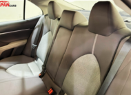 2021 Toyota Camry sedan in metallic brown front side view