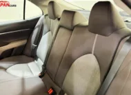 2021 Toyota Camry sedan in metallic brown front side view