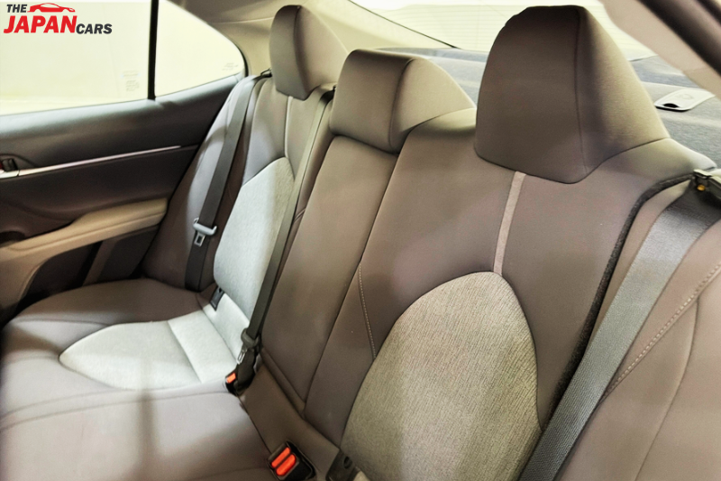 2021 Toyota Camry sedan in metallic brown front side view