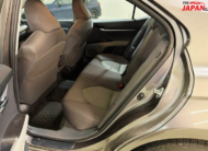 2021 Toyota Camry sedan in metallic brown front side view