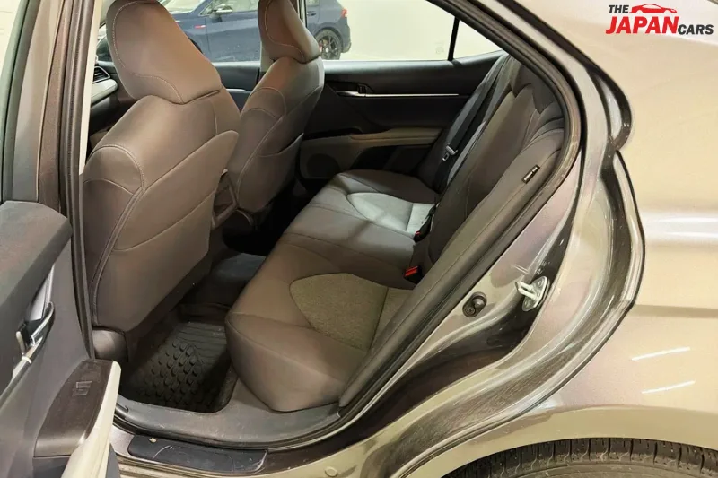 2021 Toyota Camry sedan in metallic brown front side view