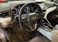 2021 Toyota Camry sedan in metallic brown front side view