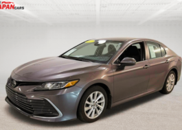 2021 Toyota Camry sedan in metallic brown front side view