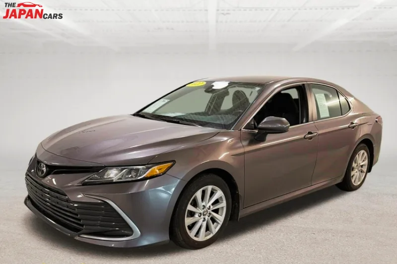 2021 Toyota Camry sedan in metallic brown front side view